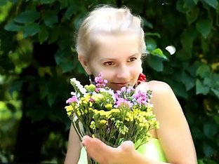 beautiful girl loves flowers